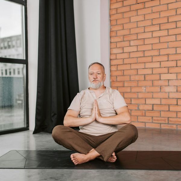 Person looking calm and focused, embodying mental and physical balance.